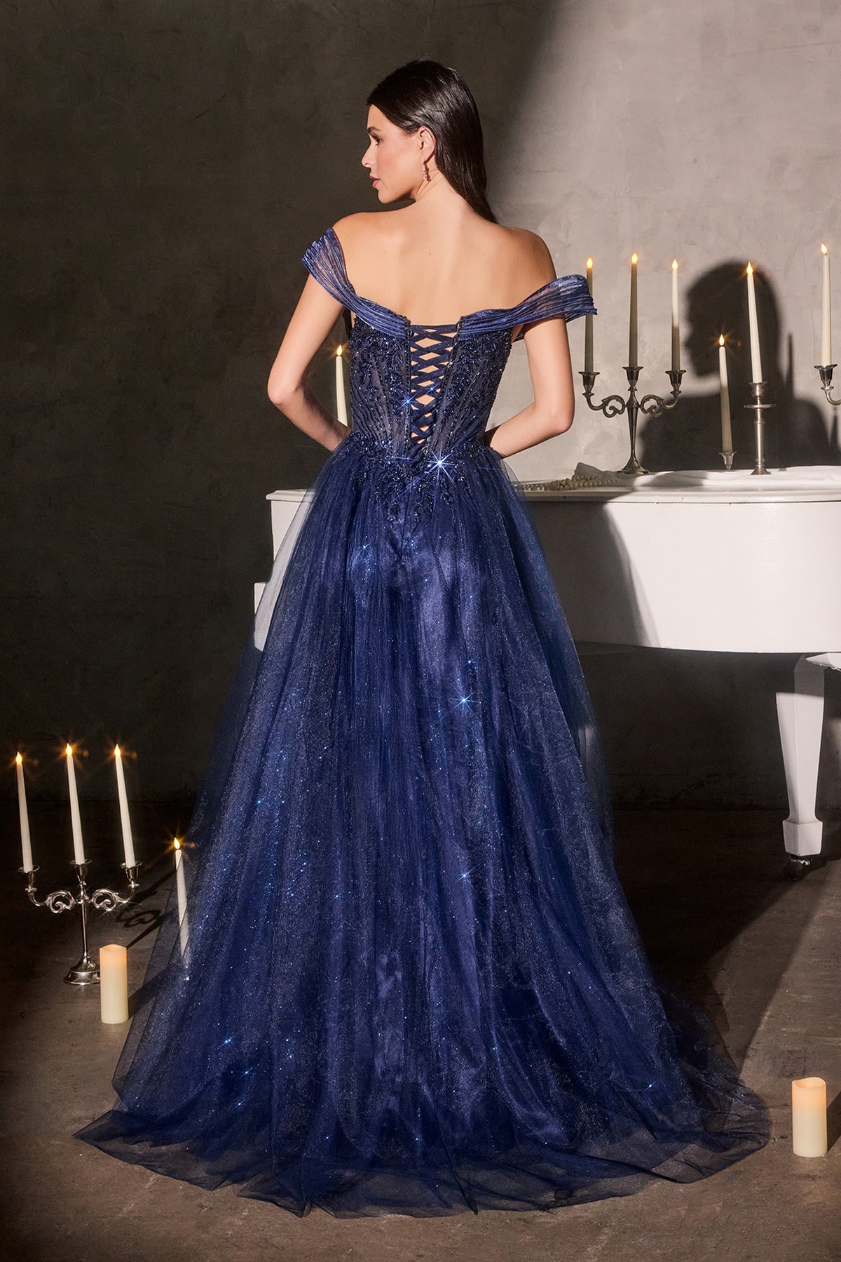 Nocturne dress — Navy back view showing the corset lacing and short train.
