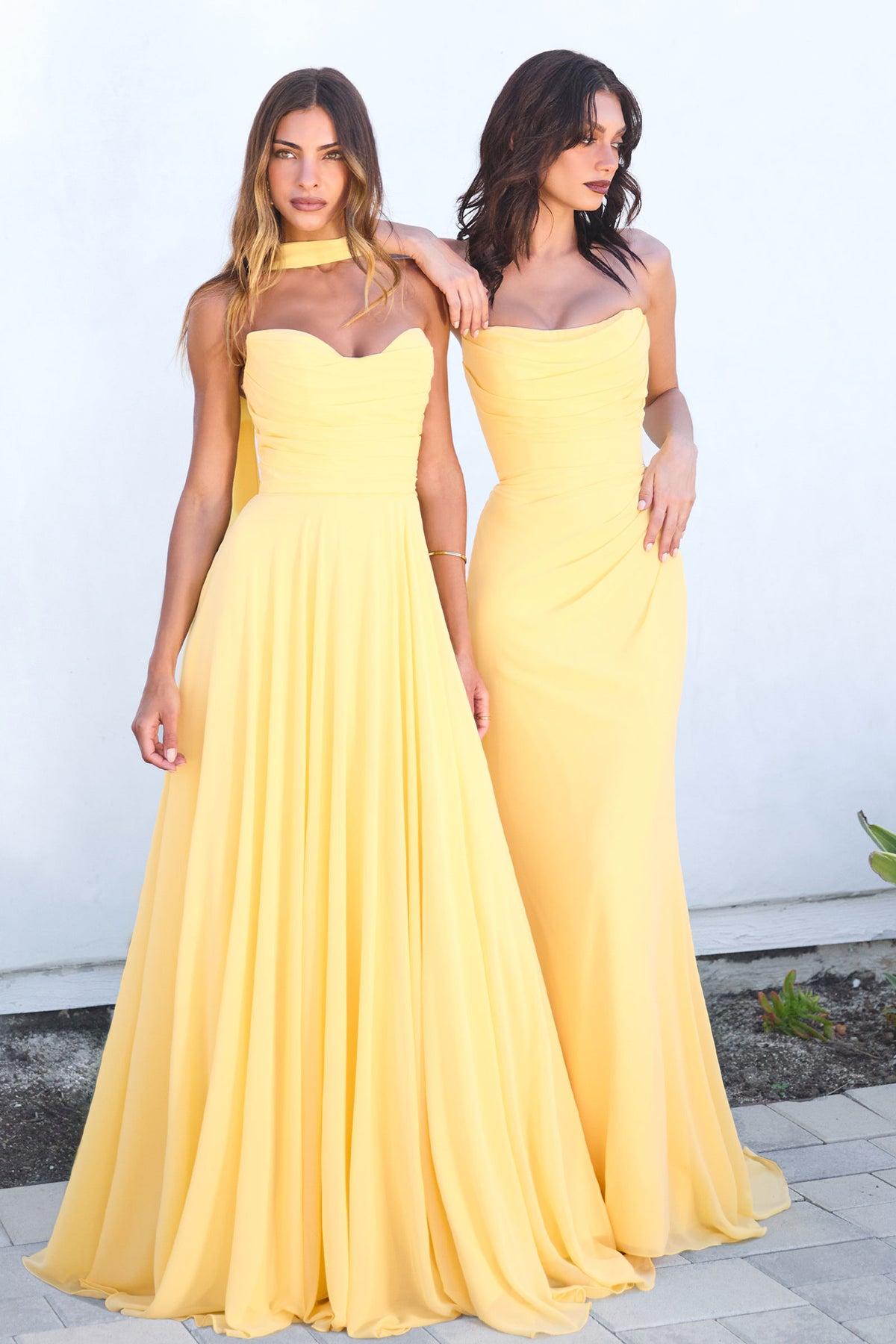 Group portrait of formal dresses with different necklines and skirt silhouettes.