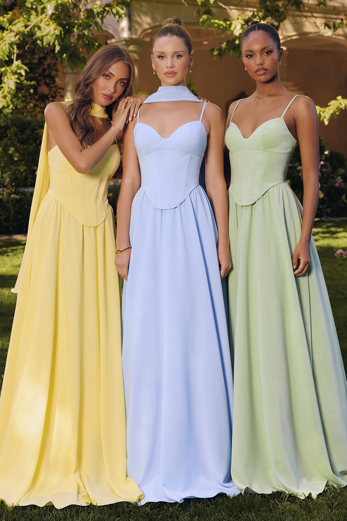 Group portrait of formal dresses with different necklines and skirt silhouettes.