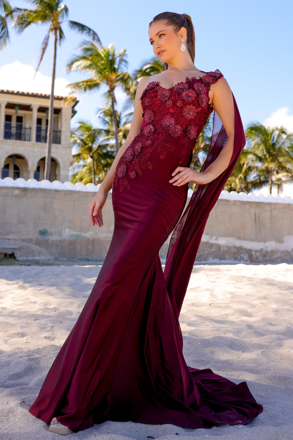 388 one-shoulder floral cape gown, wine, front view