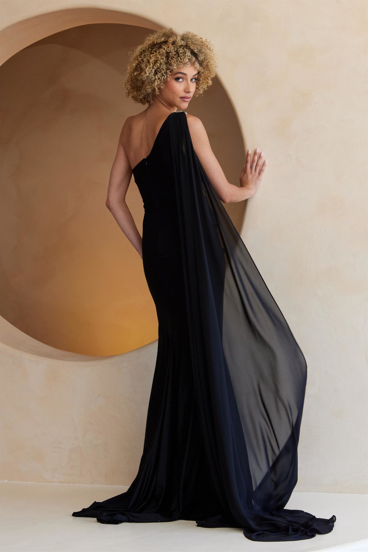 7056 one-shoulder draped gown with cape, black, back view