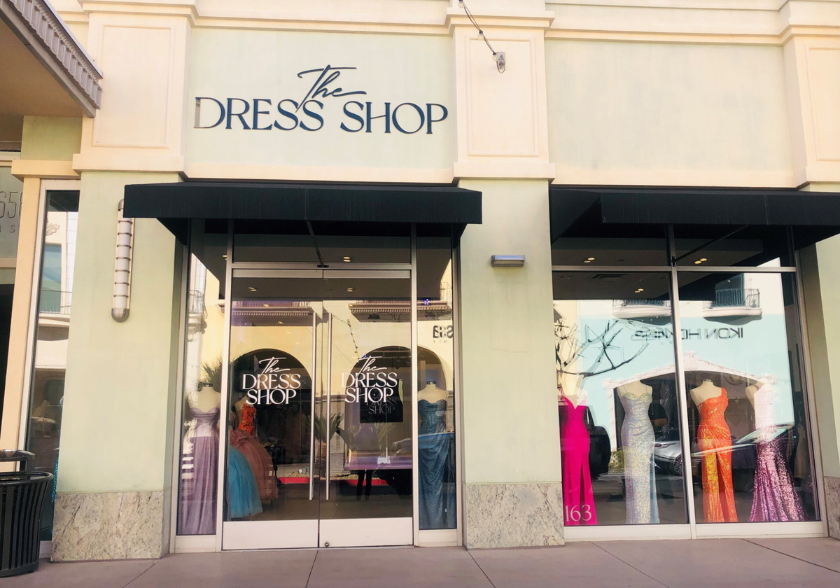 The Dress Shop storefront at Town Square Las Vegas with formal dresses on display