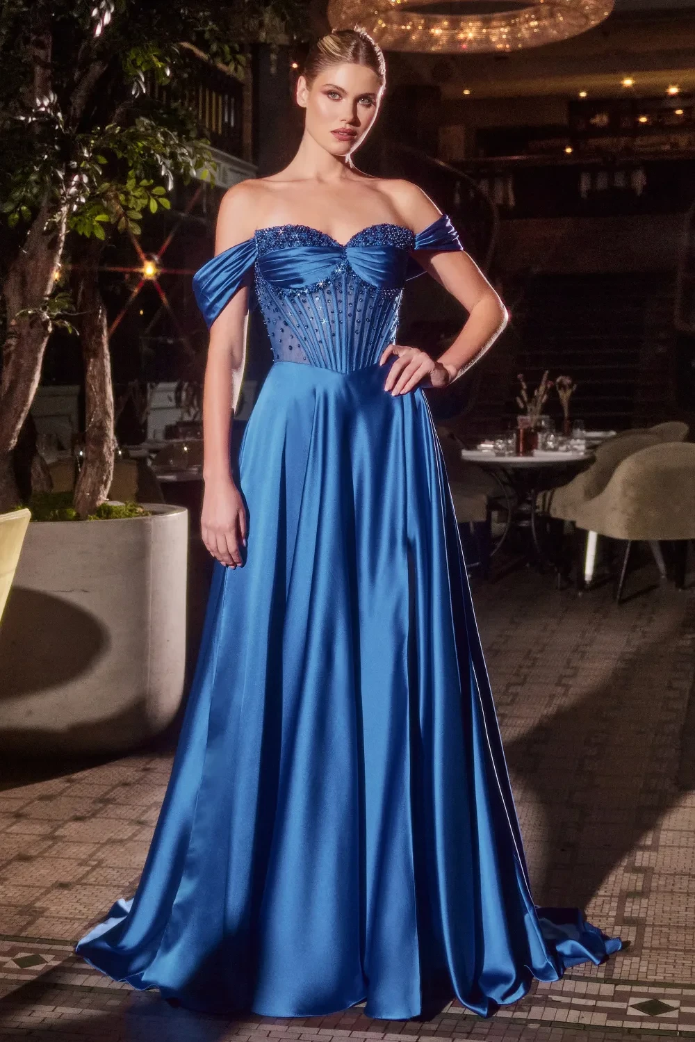 Model wearing a blue gown